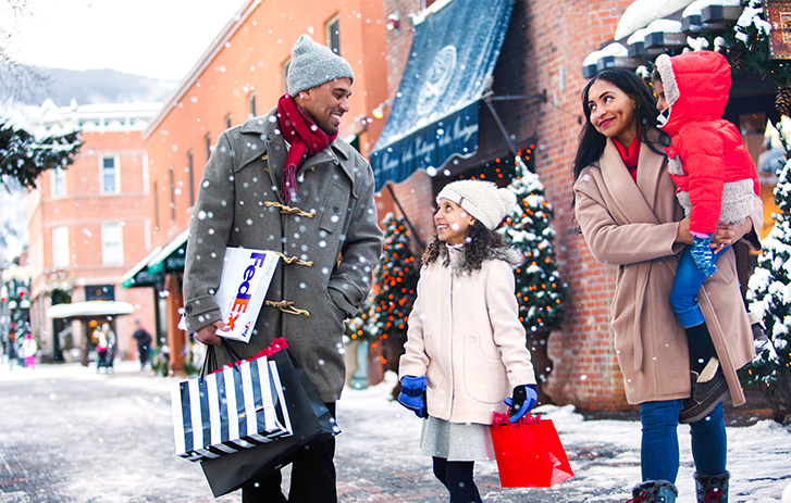 Family picking up holiday packages Family picking up holiday packages