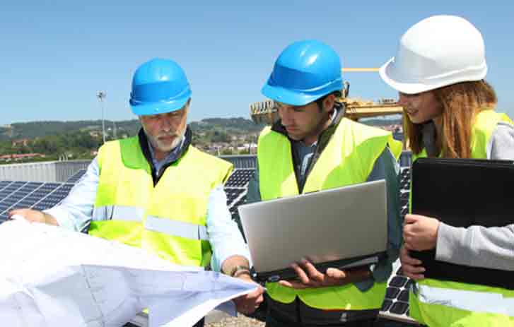 Consturction workers looking at a map