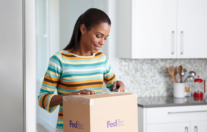 Customer sealing up a package