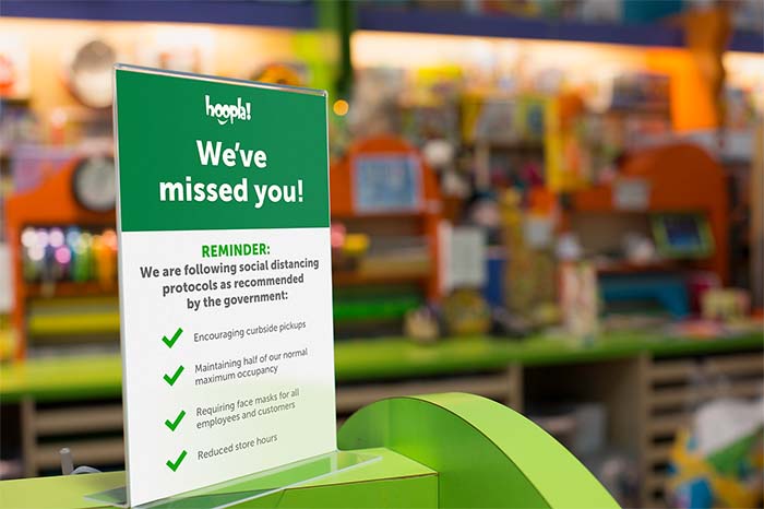 Small we missed you store sign