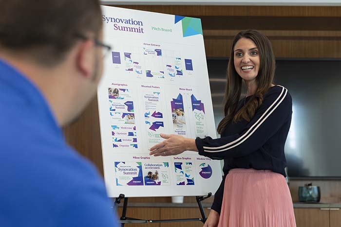 Woman presenting sign design