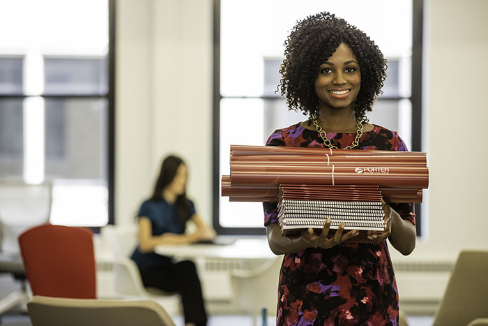 Woman holding print products