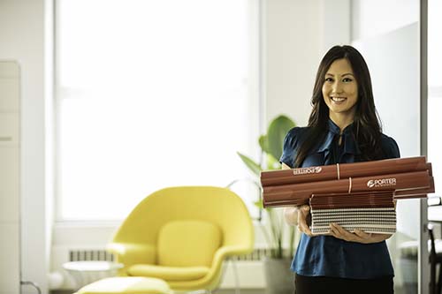 Woman holding print products