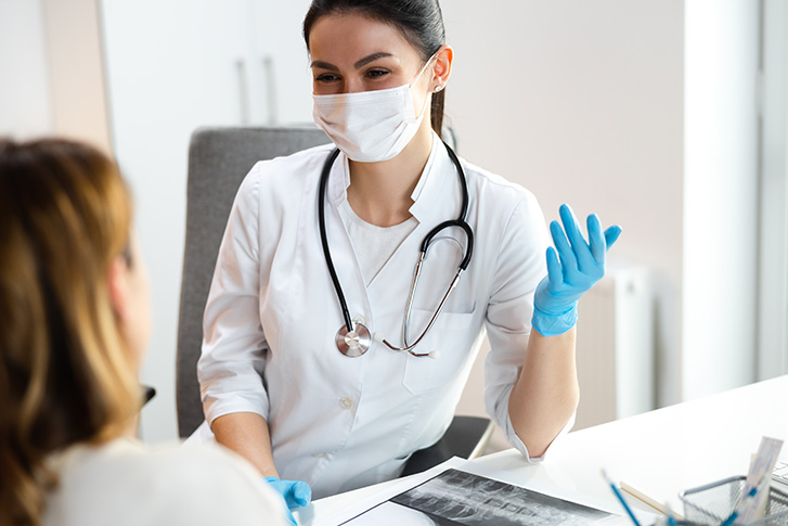 doctor consulting with patient