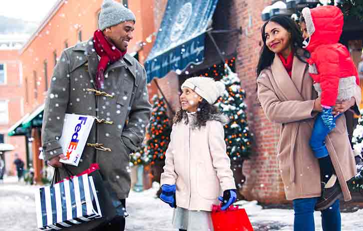 Family with holiday gifts