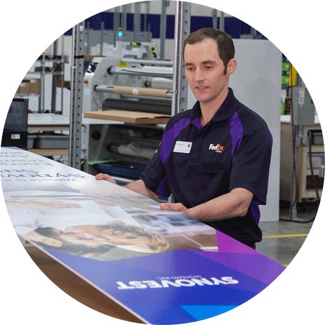 Fedex employee with a large print