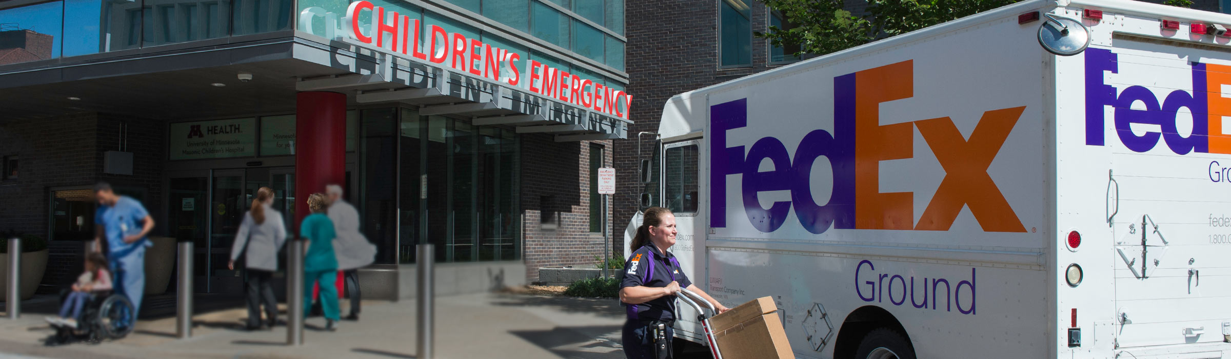 FedEx Ground truck parked outside of hospital delivering hazardous materials
