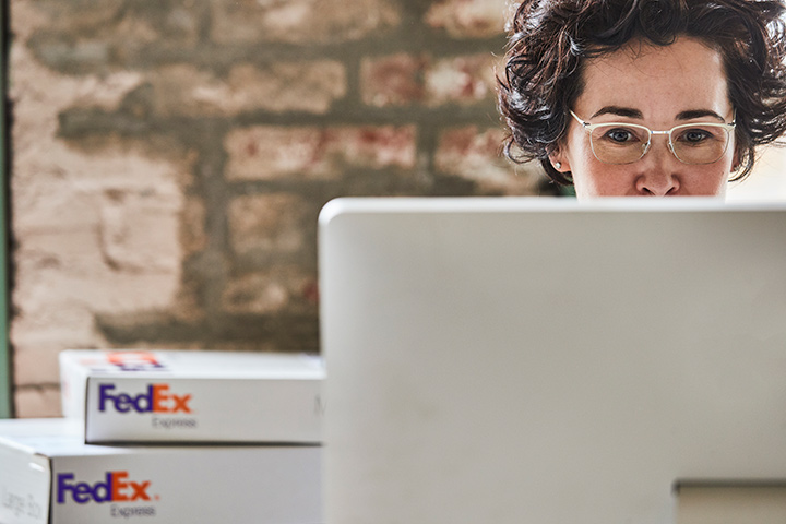 Woman looking at computer monitor