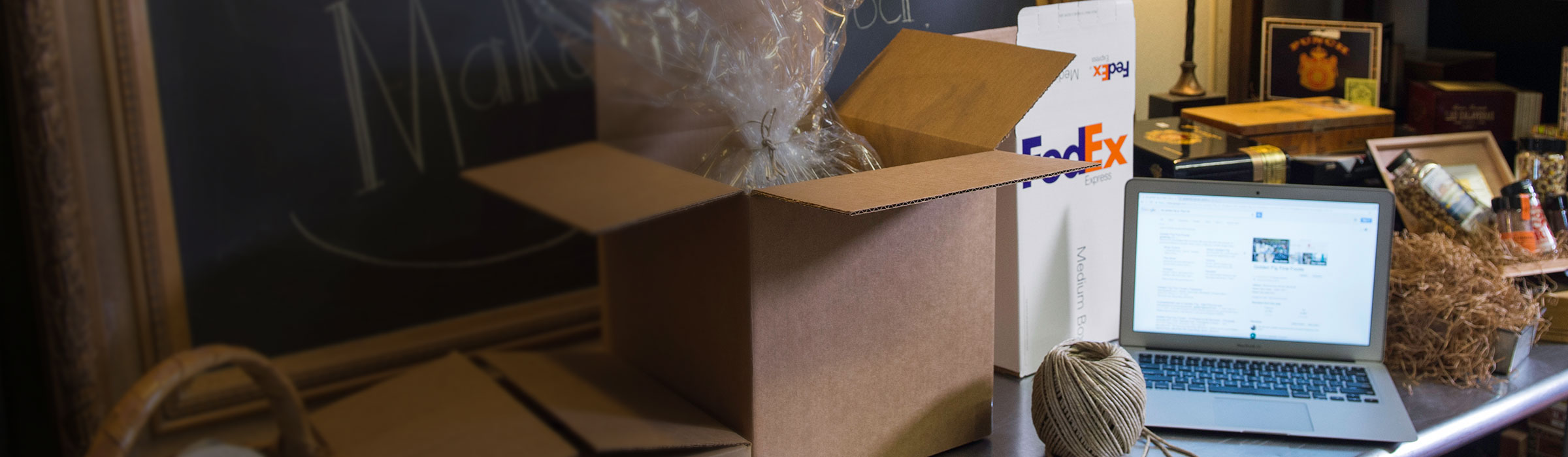 Open package sitting next to laptop