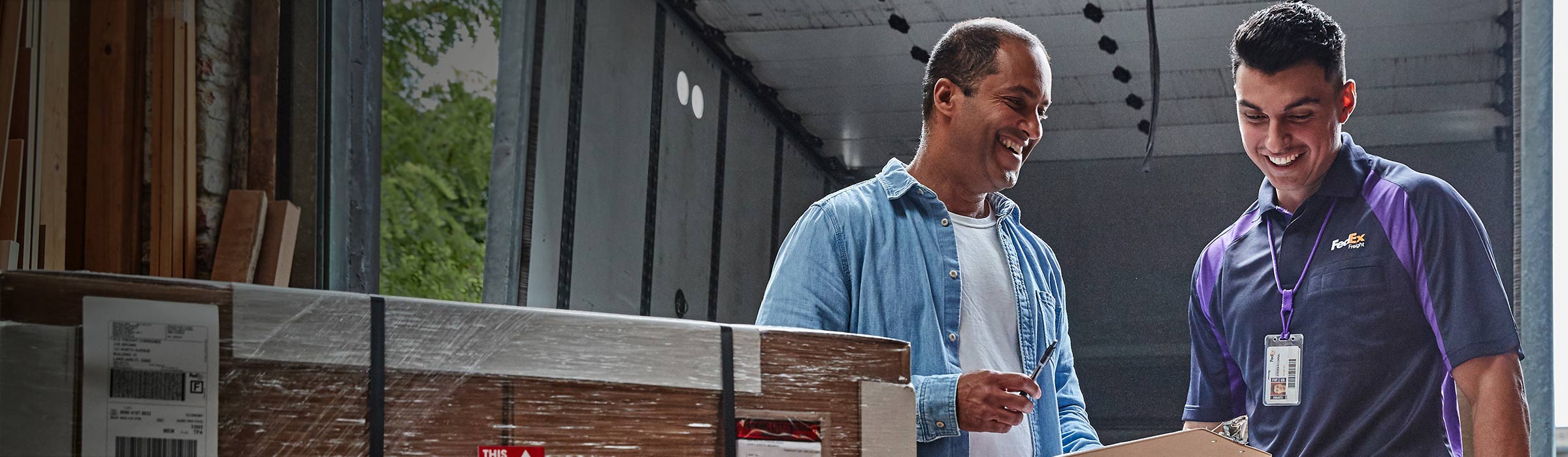 FedEx Freight employee with customer