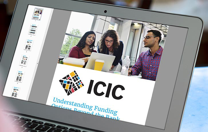 A visual of the ICIC PDF on a laptop screen.