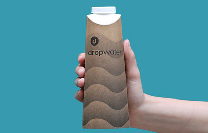 A photo of a hand holding a Drop Water bottle