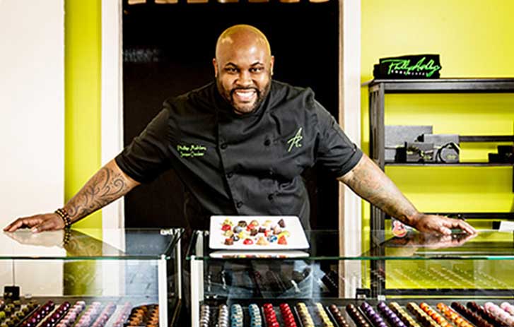 A photo of Phillip Ashley Rix in his boutique chocolate shop