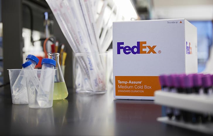Tray of small medical vials in a lab