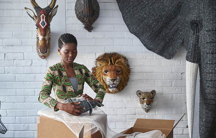 woman packing valuable art