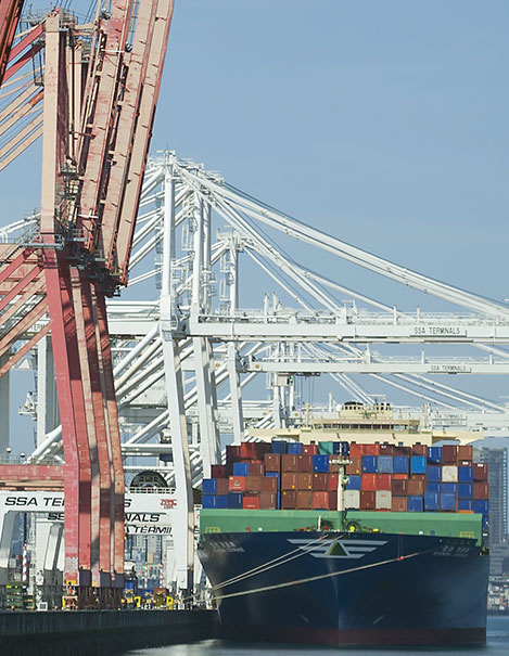 A docked ship loaded with cargo
