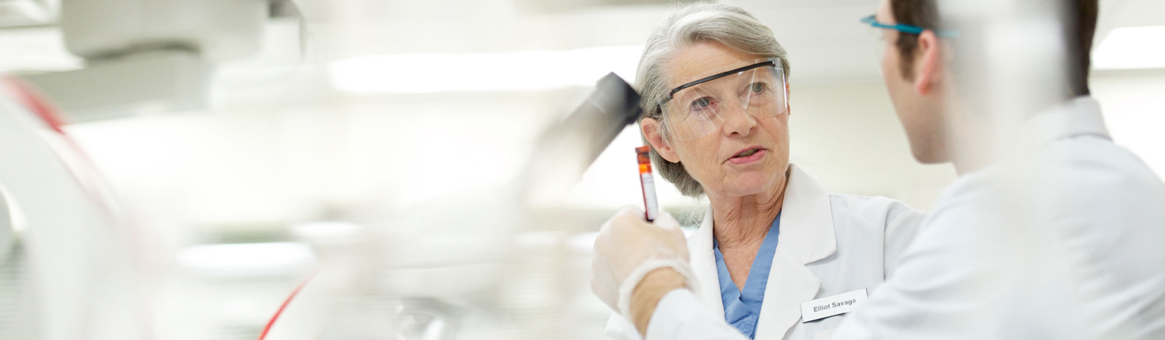 Lab technicians talking to each other