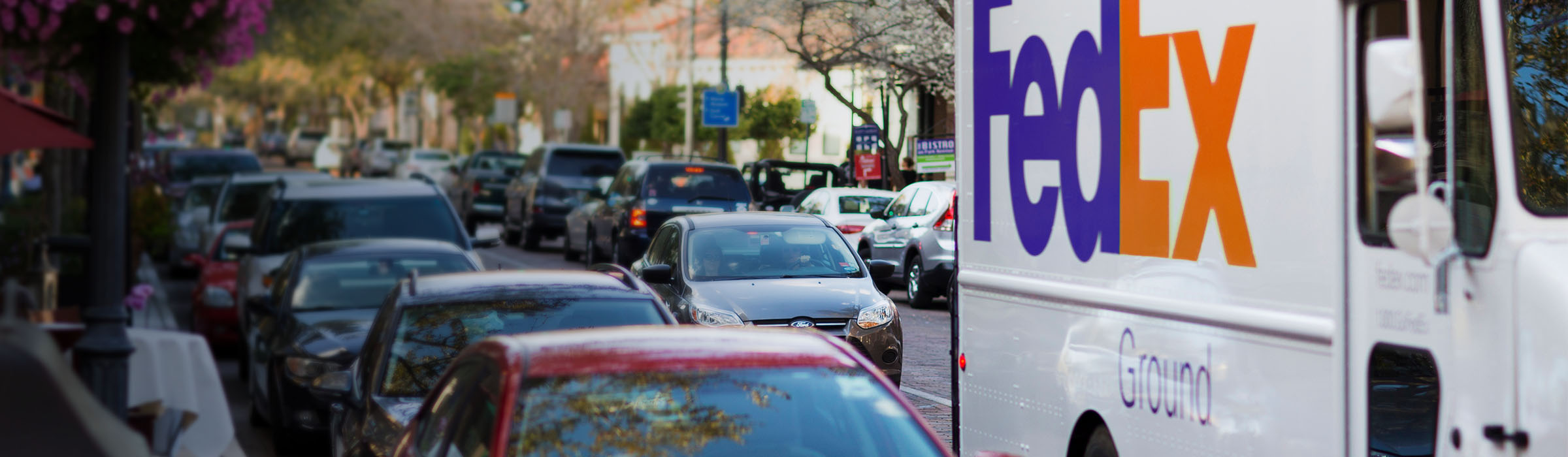 FedEx Ground Truck traveling through traffic