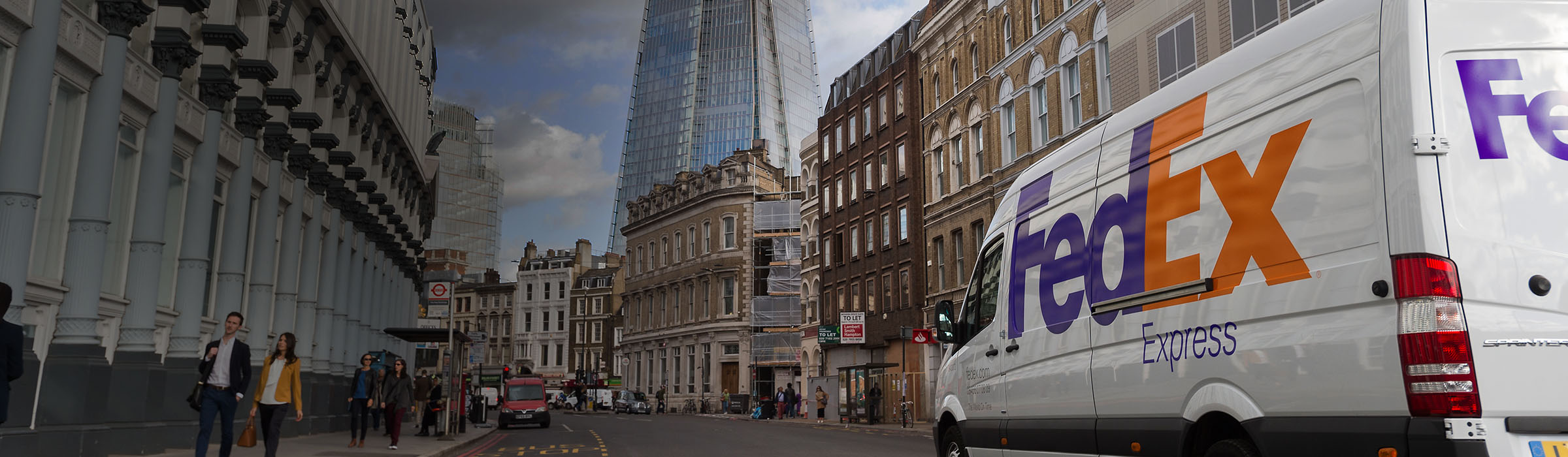 FedEx Express Van driving through city