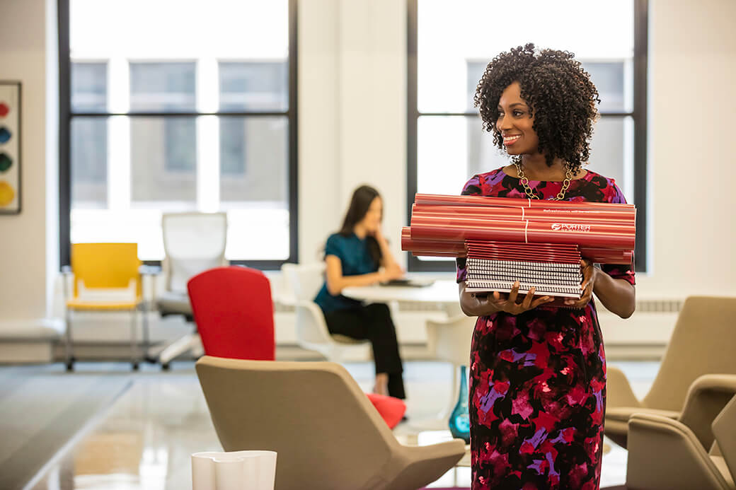 Woman carrying her project