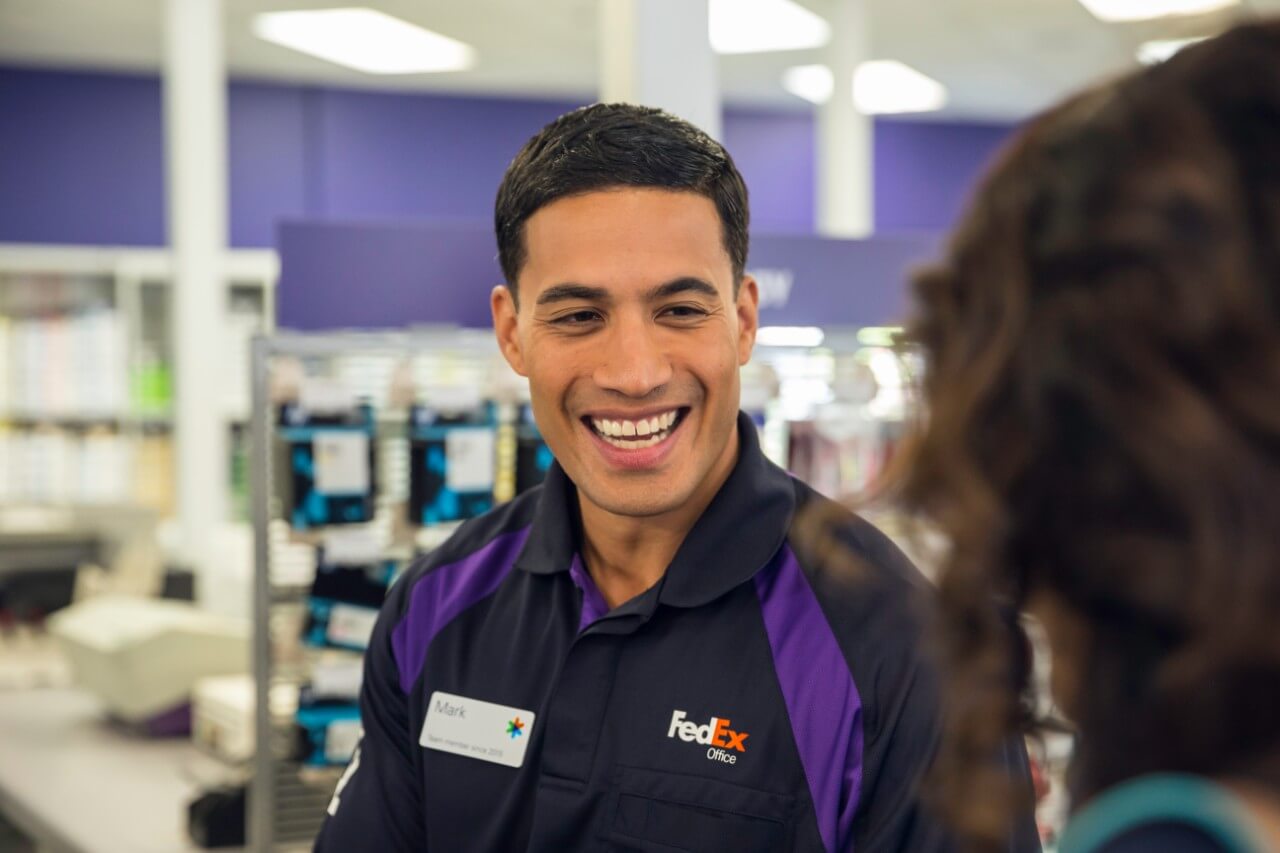 FedEx Office team member happy to help a customer