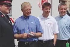 2009 - Denny Hamlin posing with Coach Joe Gibbs