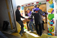 2012 - Denny Hamlin delivering packages