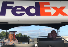 2020 - 3 cutouts of College graduates in Hamlin's team pit box
