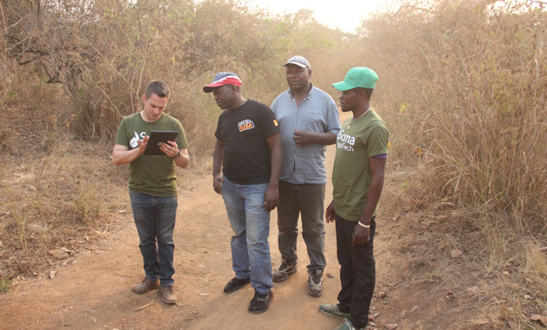 An image of founder Jeff Abella with community members.