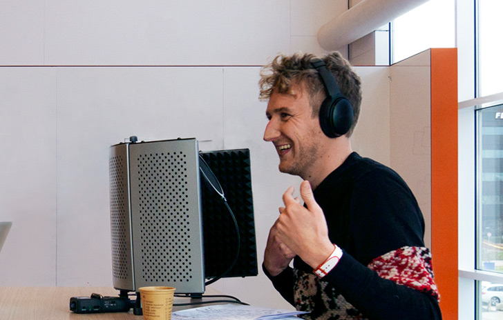 Tom the presenter speaking during a podcast