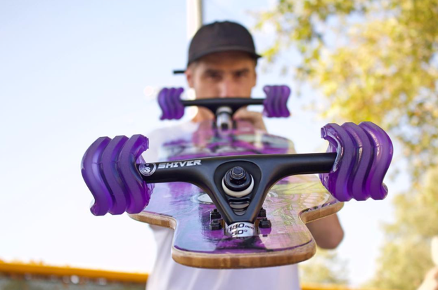 Zack Fleishman, co-founder of Shark Wheel, posing with skateboard.