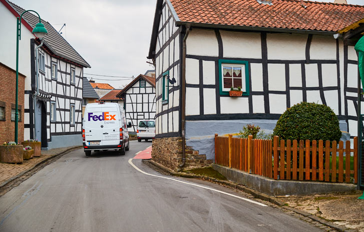 fedex delivery vehicle in European city streets