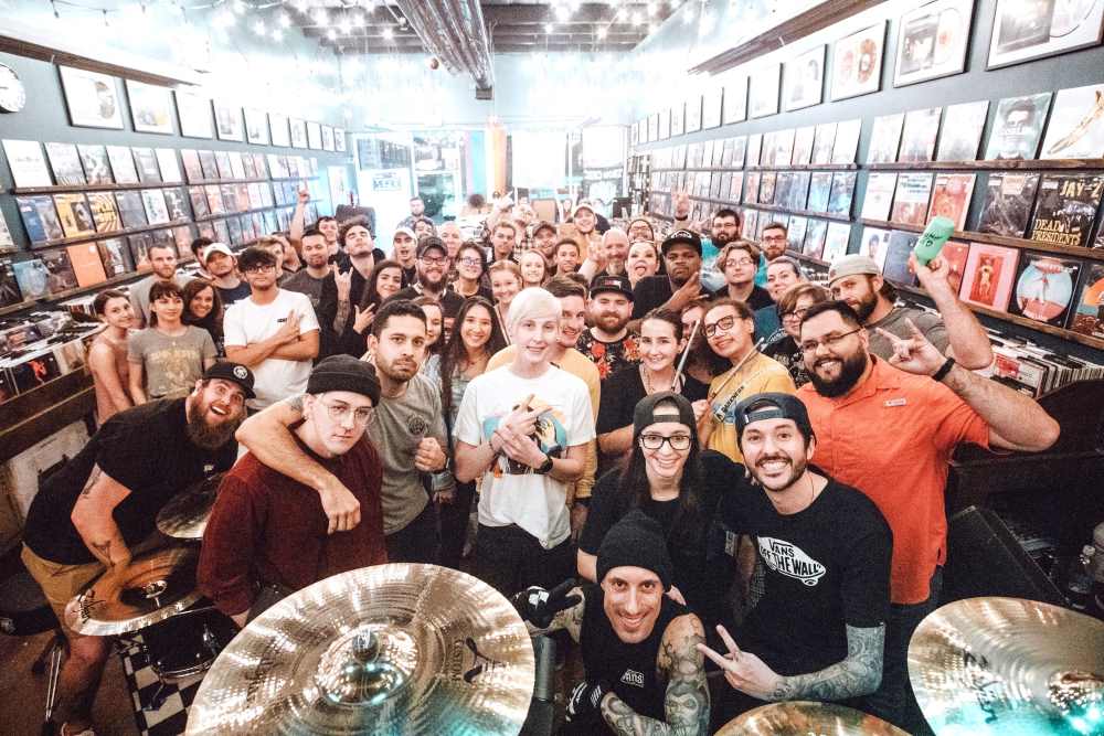 A photo of SJC Custom Drums staff.