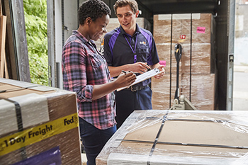 FedEx Freight Driver Talking to a Customer