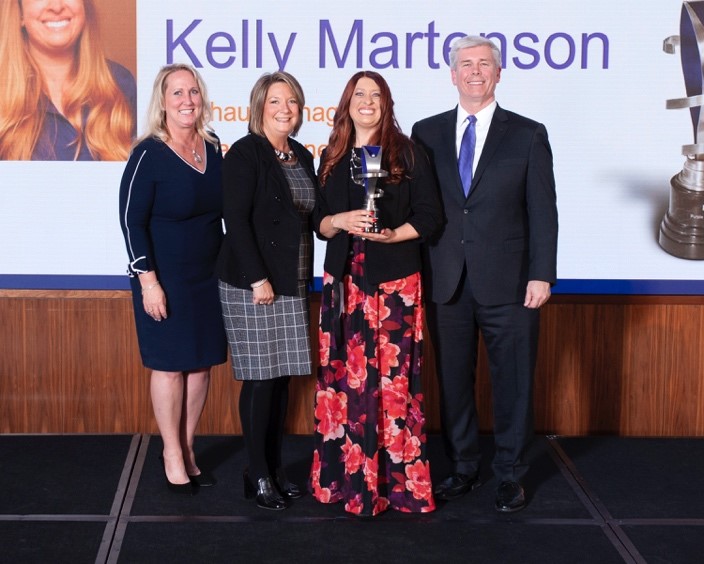 Team members accepting award