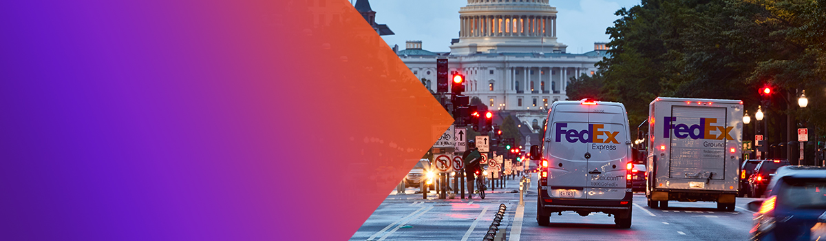 Two FedEx Trucks and the US Capitol