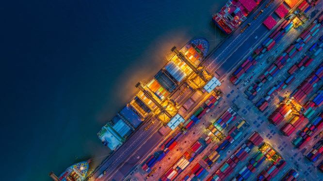 FedEx Trade Ships Overhead view of colorful freights at dock
