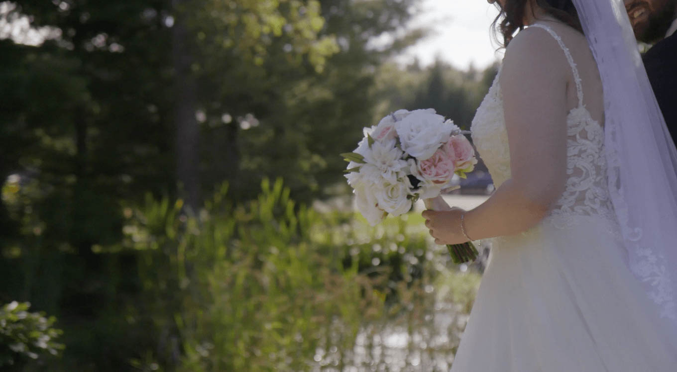 bride holding flowers