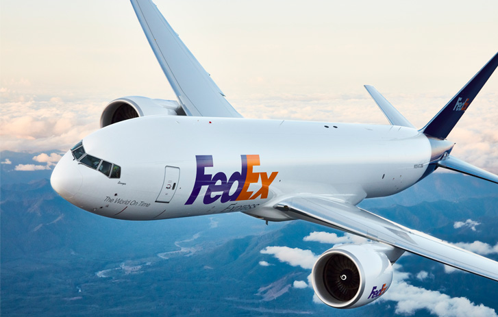 FedEx airplane flying in mid-air