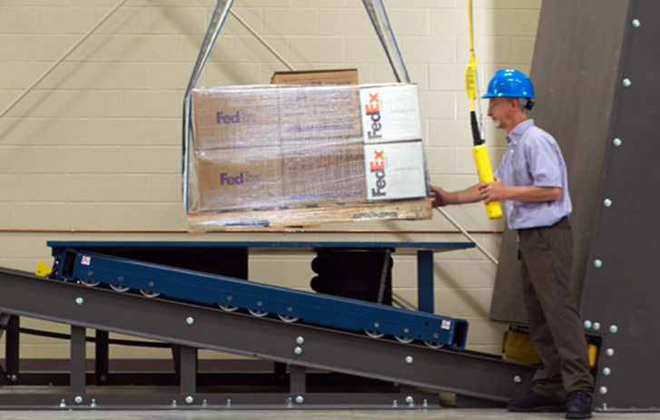 fedex worker testing freight package