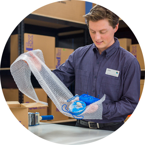 FedEx Office® employee packing item