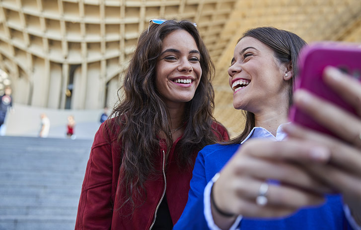 Two women smiling
