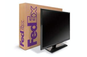 Image of brown FedEx Medium flat-panel TV box with TV in front.