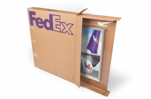 Image of brown FedEx Medium framed art box with Airfloat system with framed artwork inside.