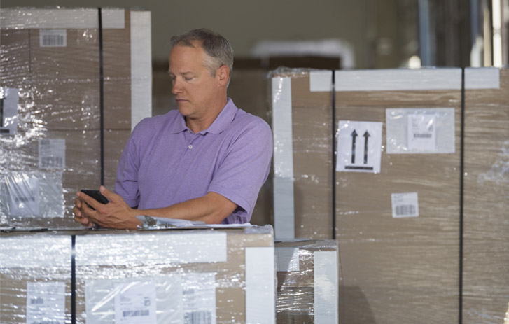 man packing freight goods